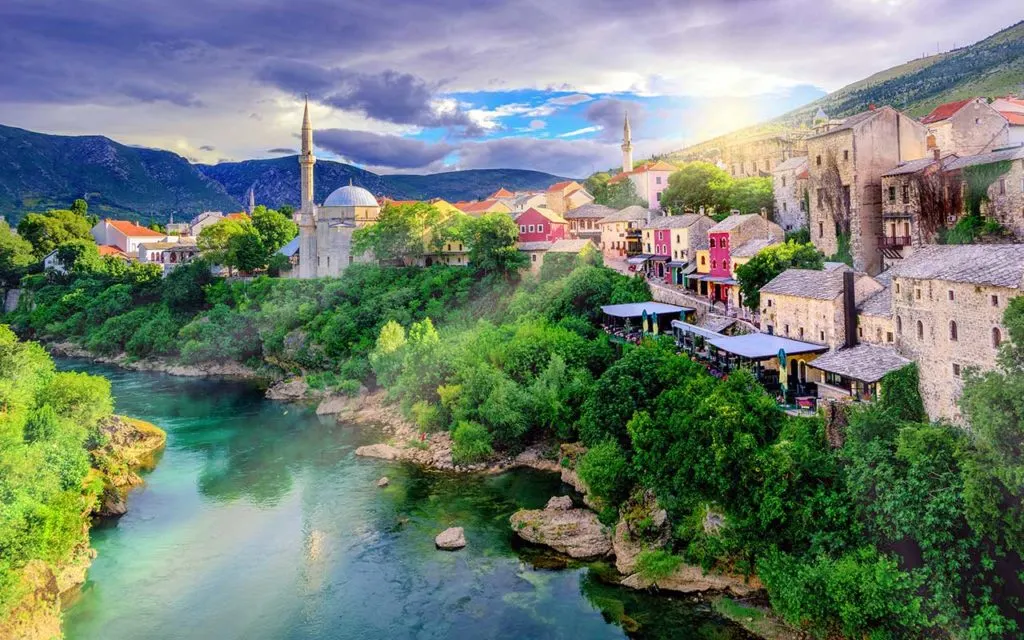 Sunrise over Mostar Old Town and Neretva river 