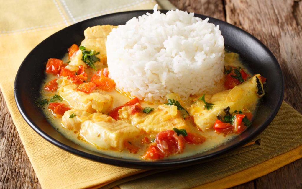 Ecuadorian food: encocado de pescado - fish in coconut stew