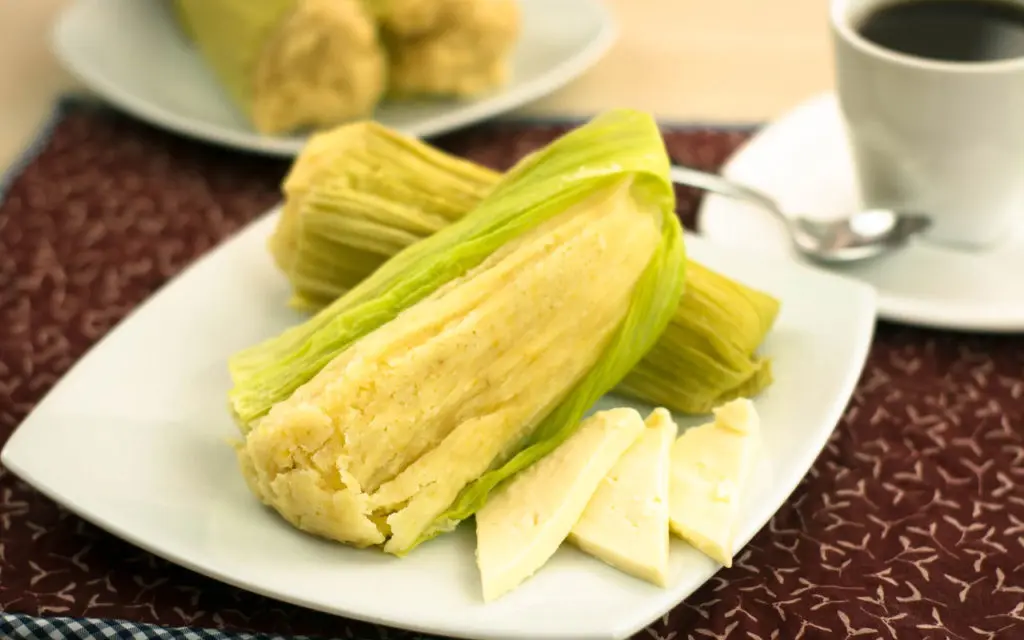 Ecuadorian food: humitas - steamed corn husk filled with ground corn and cheese