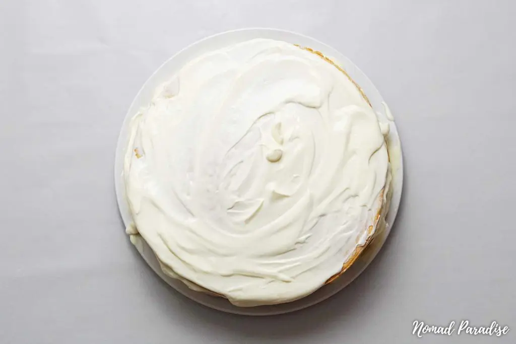 Baked Russian Honey Cake (Medovik) layers with frosting on top