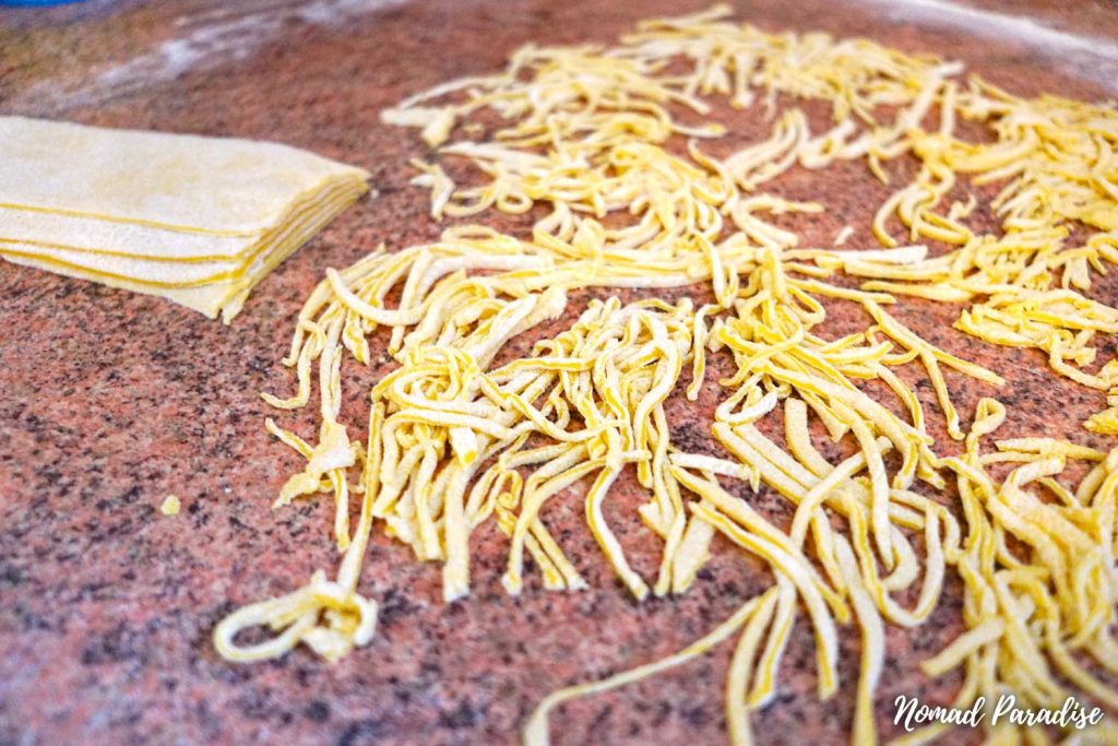 Making egg noodles (cut noodles).