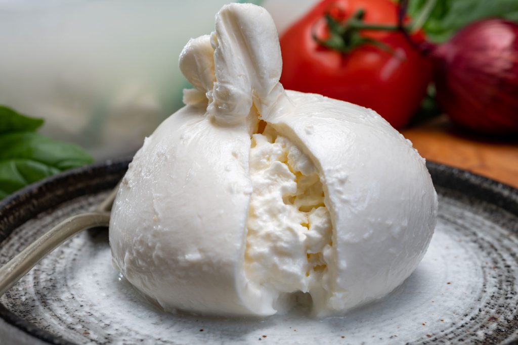 Burrata - an up close picture showing the filling