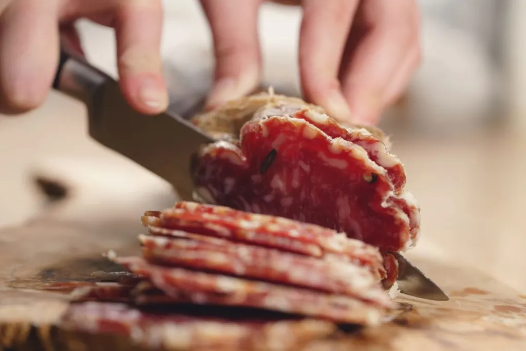 Slicing salame.