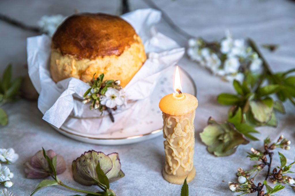 Babka (Бабка) – Sweet Easter Bread on a table with Easter-themed decor around.