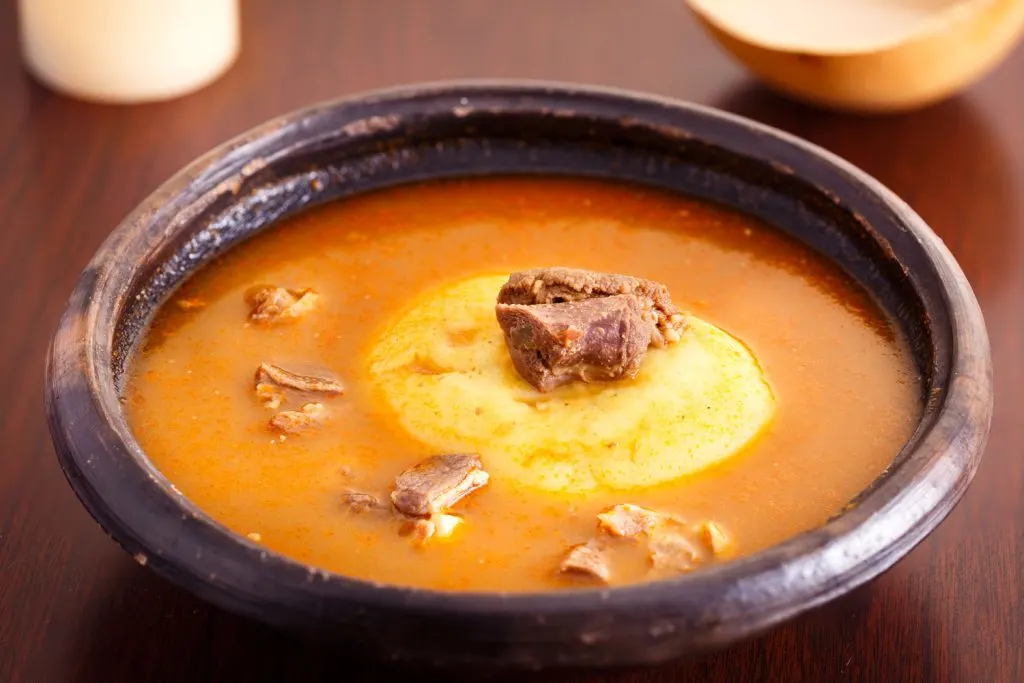 Fufu in a bowl of soup.