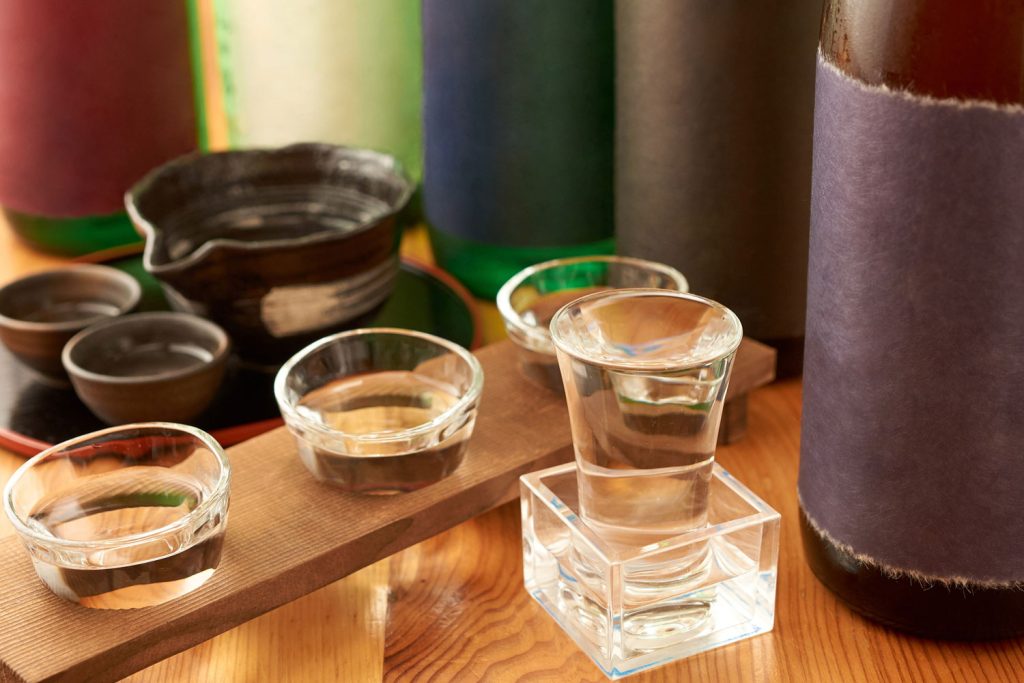 Japanese sake in small glasses.