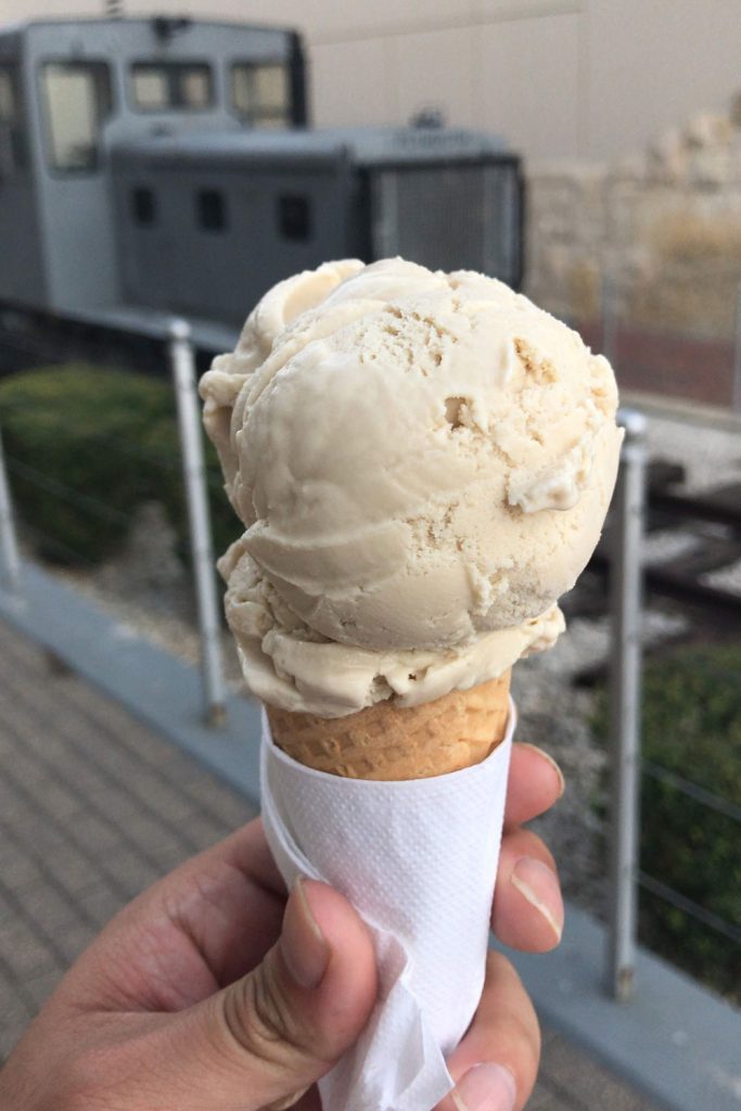 Guinness ice cream scoop in a waffle cone.