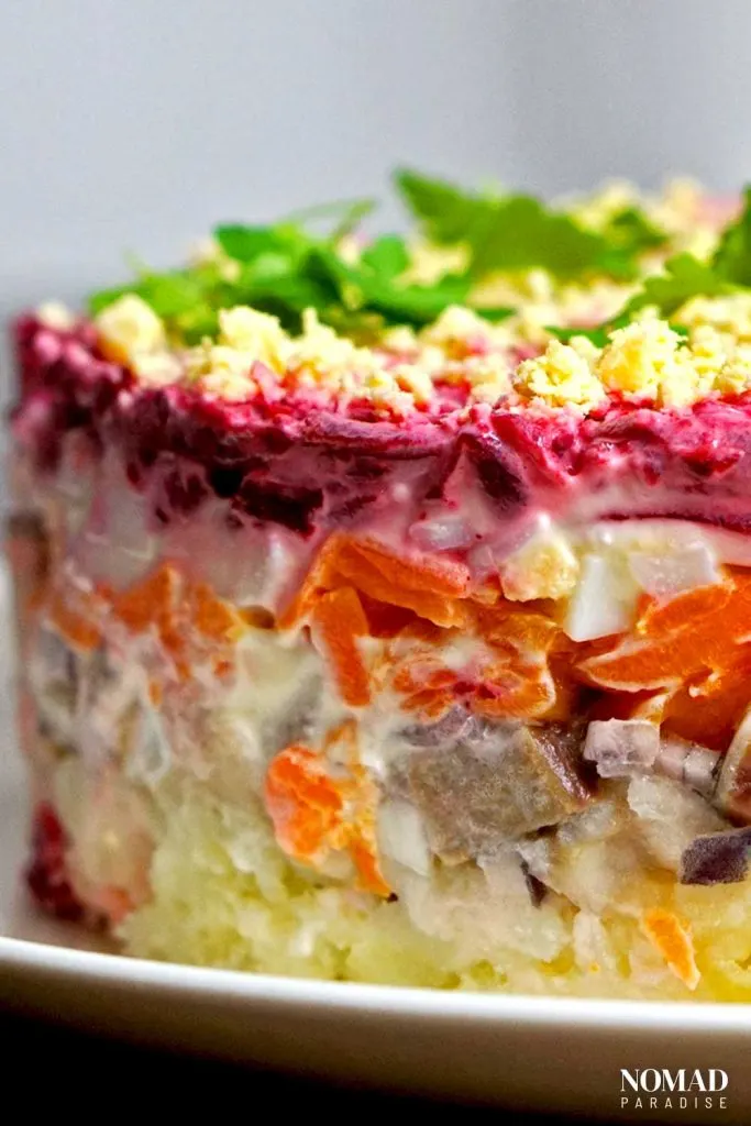 Herring under a fur coat (layers from the side with the beetroot layer on top).