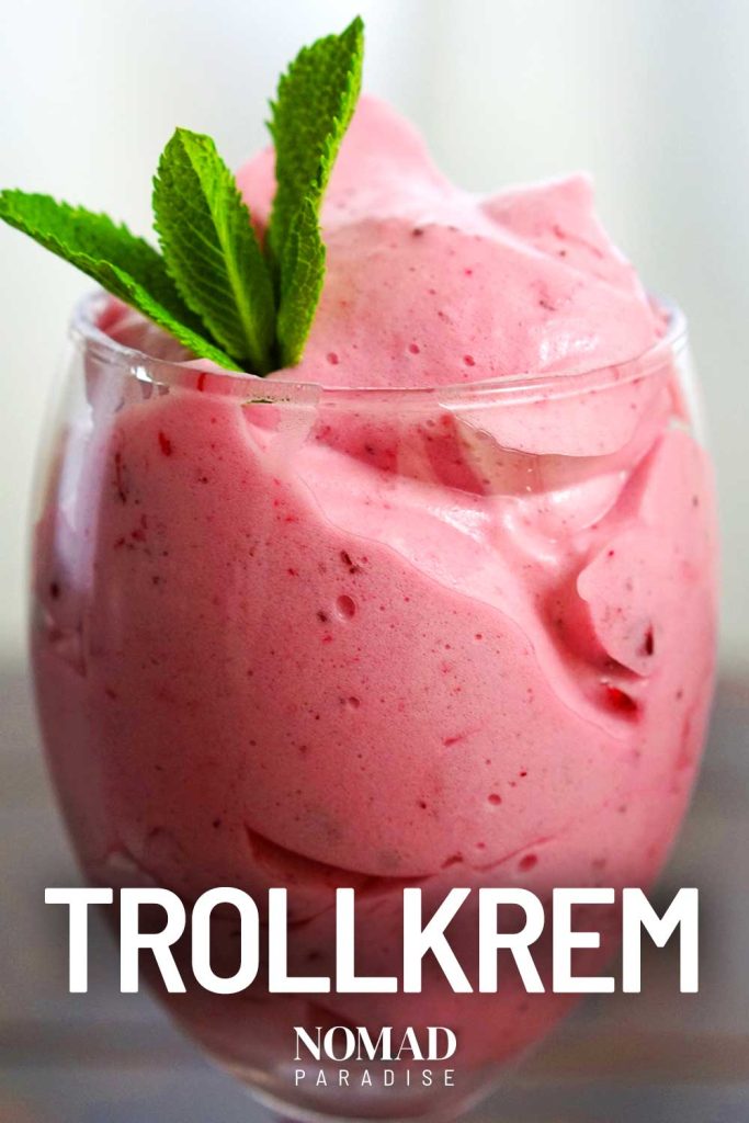 Trollkrem in a tall glass, decorated with fresh mint.
