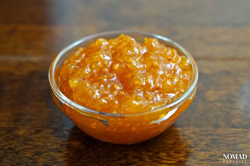 Cloudberry jam in a small glass bowl.