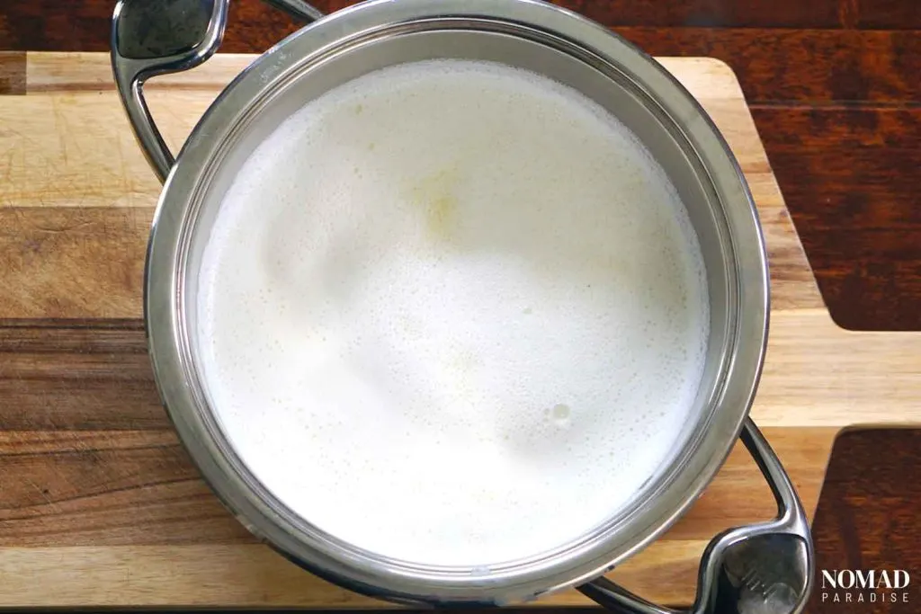 Homemade Farmer's Cheese Recipe step-by-step (boiling milk in a pot).