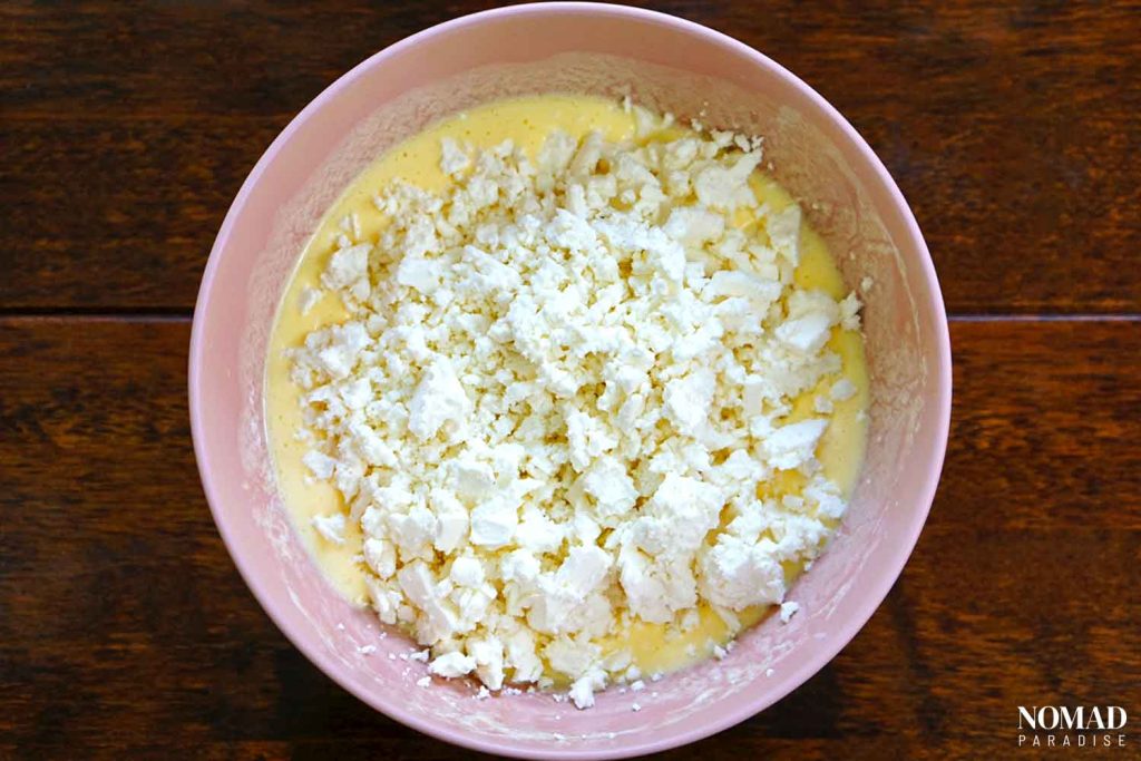 Banitsa Recipe Step by Step (the eggs, oil, yogurt, and baking soda mixture with feta cheese).