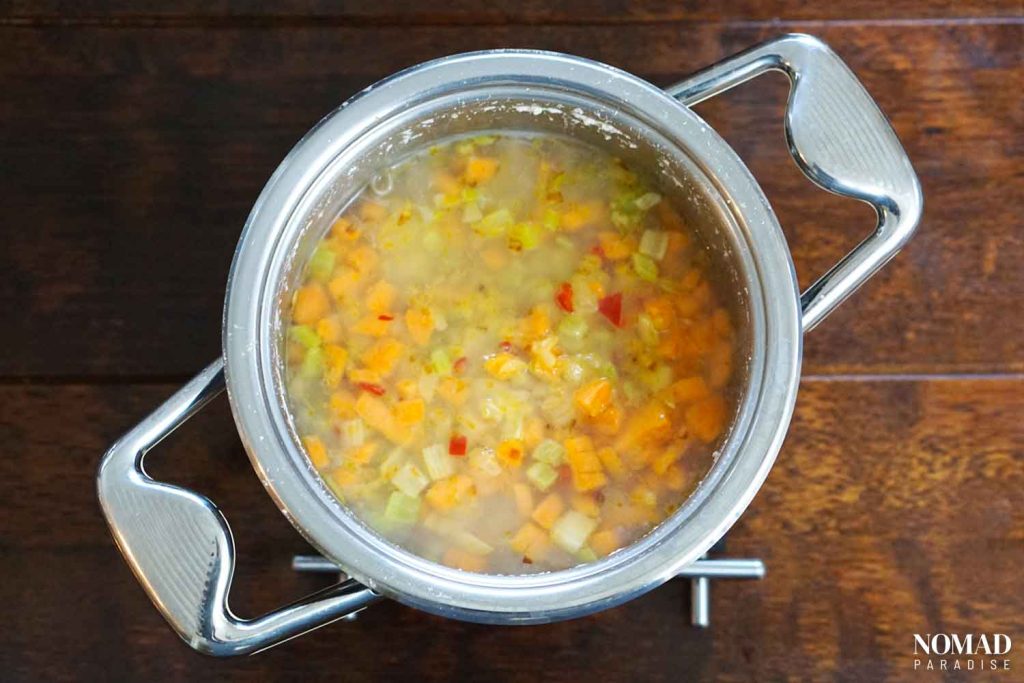 Bob Chorba step-by-step recipe (adding the veggies to the pot of beans).