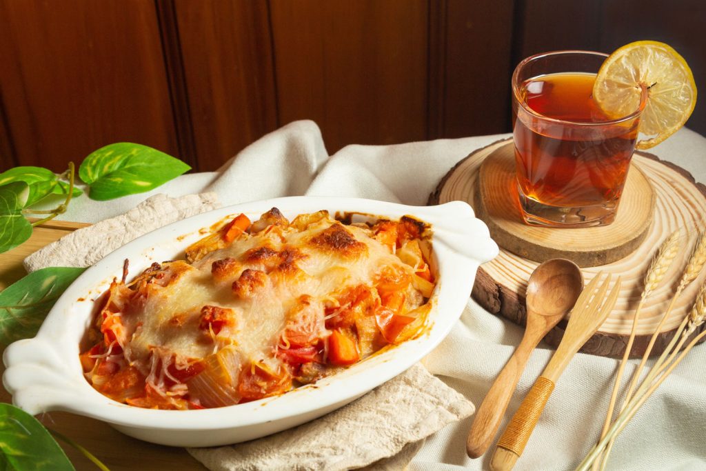 Baked Pork Chop Rice with a glass of cold tea on the side