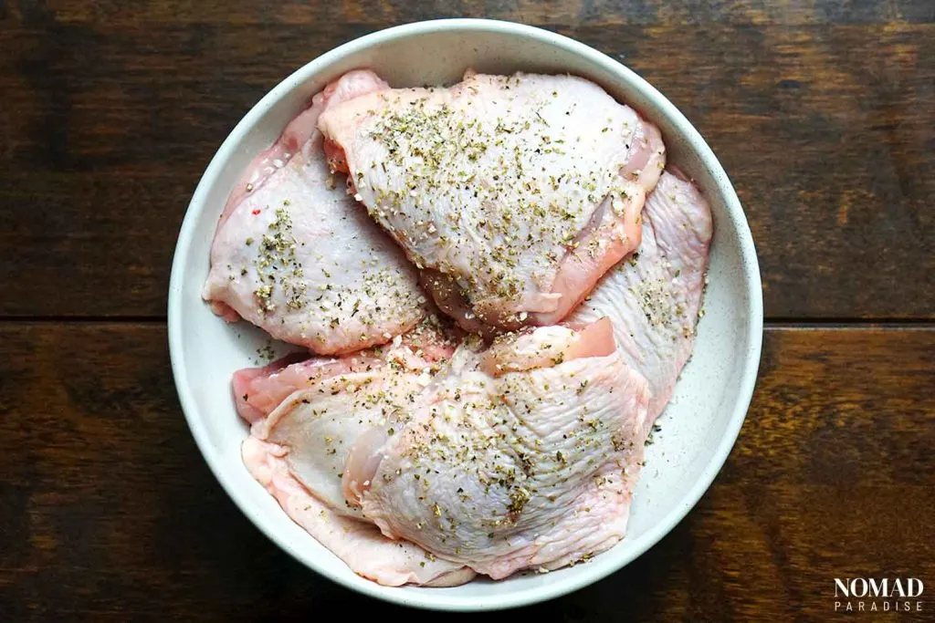 Chicken vesuvio step-by-step (seasoning the chicken thighs)