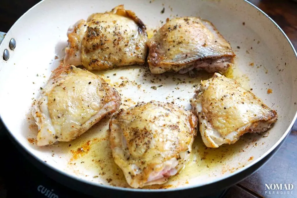 Chicken vesuvio step-by-step (frying the chicken thighs in the pan)
