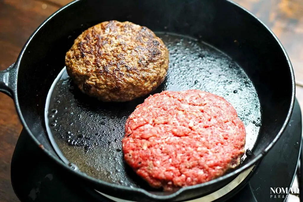Juicy Lucy Burger Step-by-Step Recipe (cooking burgers in cast iron pan).
