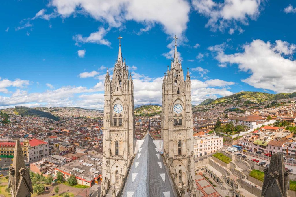 aerial view of Basilica del Voto Nacional and downtown Quito, Ecuador