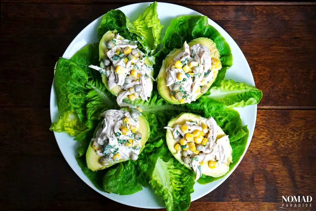 Stuffed avocados on a plate.
