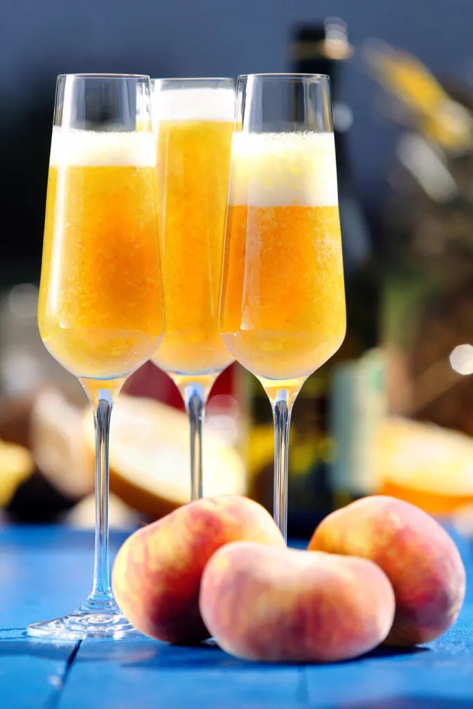 Three peach Bellinis