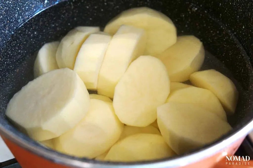 Boiling the potatoes.