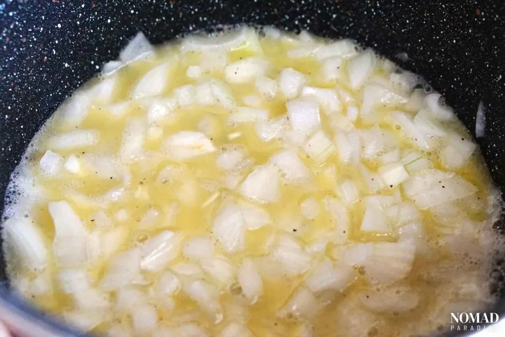 Stewing the onions to be used on top of the burger patty