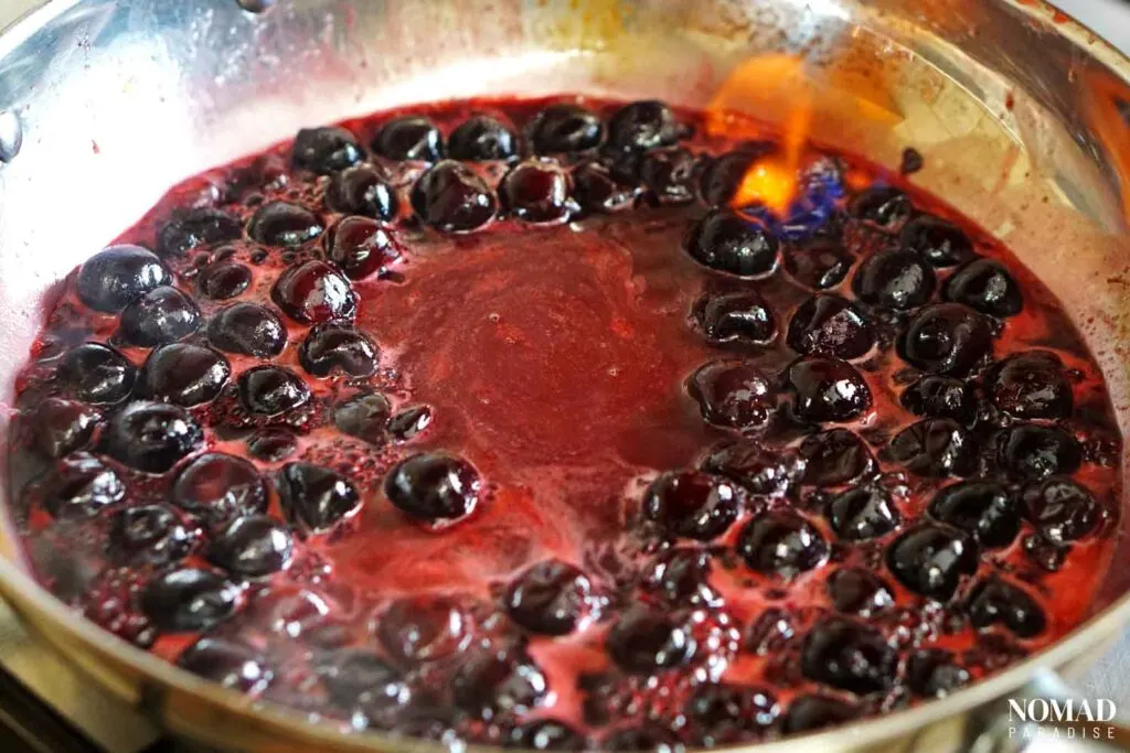Cherries Jubilee sauce - flambeing it in the pan.
