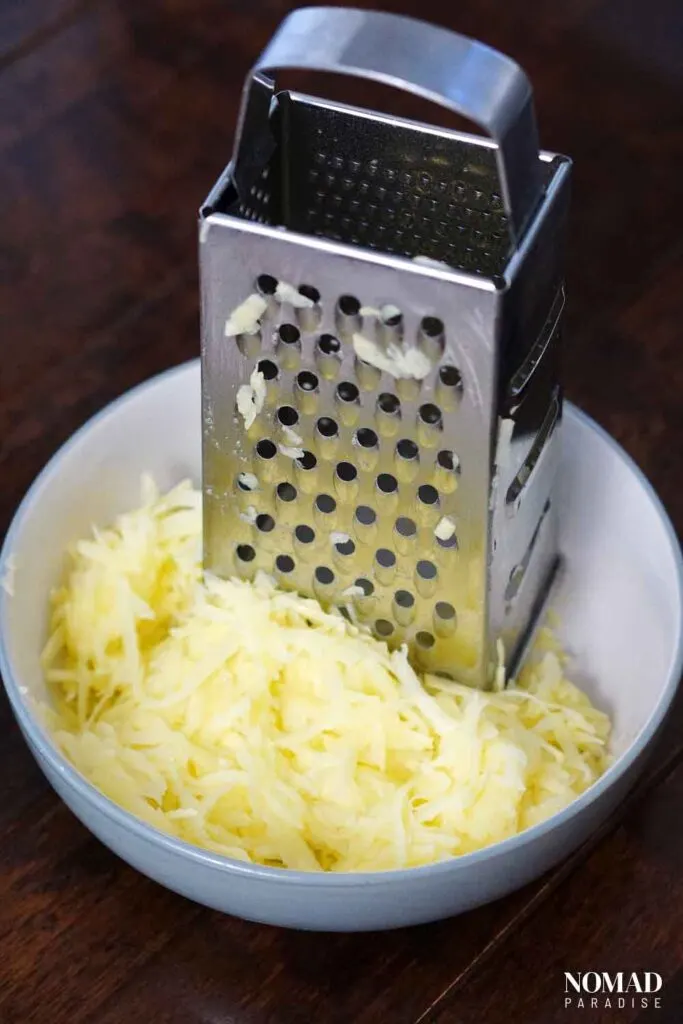 Grating the potatoes